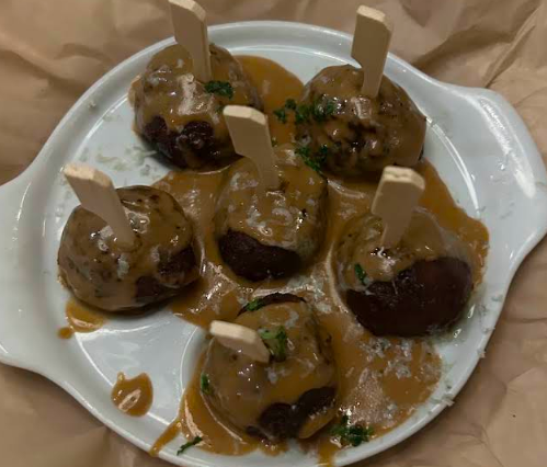 Neighborhood Services signature dishes Sea-Salted Russet Frites
Chicken Fried Steak
Butcher's Meatballs